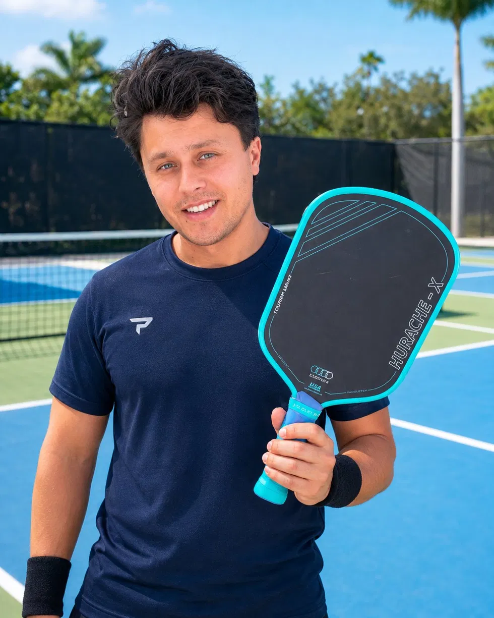 Take Pickle Ball paddle on court