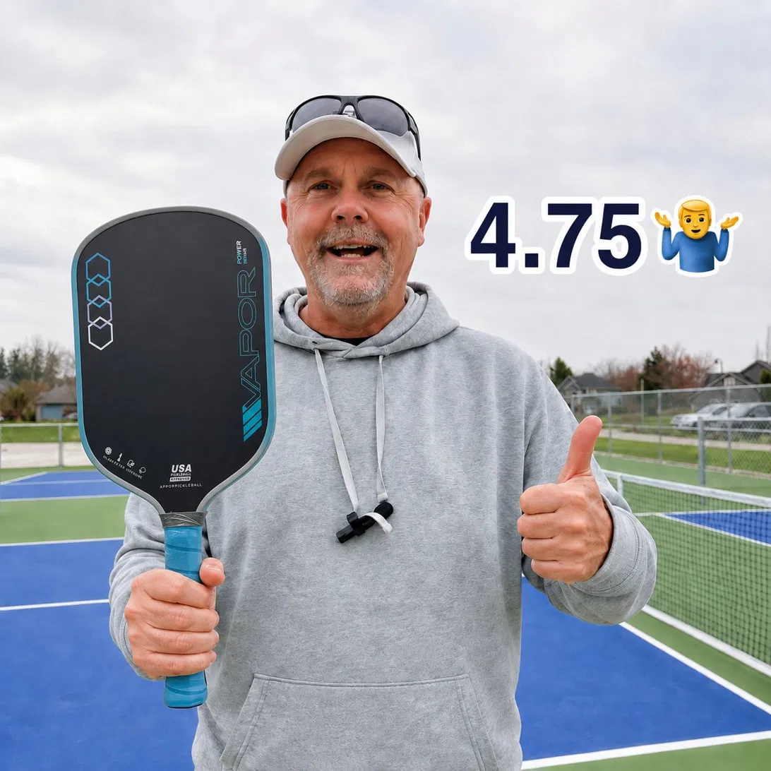 Happy player giving a thumbs up with a paddle